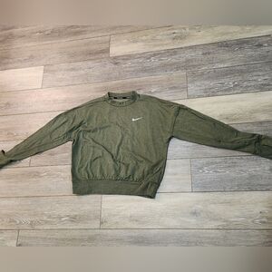 The Nike Running Women's Dri-Fit Crop Top Sweater in size Xsmall and olive green